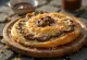 Martabak Manis s Nutellou, přeložená pochoutka s Nutellou a sezamovými semínky na vrchu.